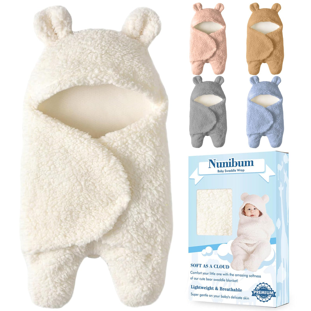 Nunibum baby swaddle close-up with bear plush for cozy newborn comfort