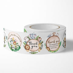 nuodslves Jungle Safari sticker on gift wrap demonstrates easy peel and secure adhesion.