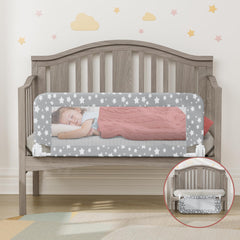 NUTIKAS crib rail guard assembly shows secure installation.