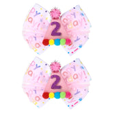 NYTGAH pink confetti birthday bow adds sparkle to baby girl's hairstyle.