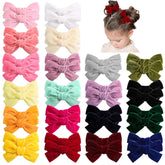 OAOLEER packshot of 40 velvet hair bows for easy outfit matching.