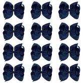 Oaooleer big navy bow on an alligator clip adds polished everyday style.