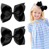 OAOLEER black layered grosgrain ribbon alligator clip closeup showing secure grip for toddlers.