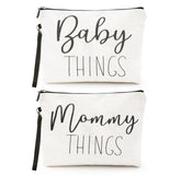 Ohmique Mommy & Baby Bag front view in canvas supports on-the-go organization