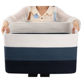 OIAHOMY blanket basket gradient blue stores blankets neatly in a stylish living room.
