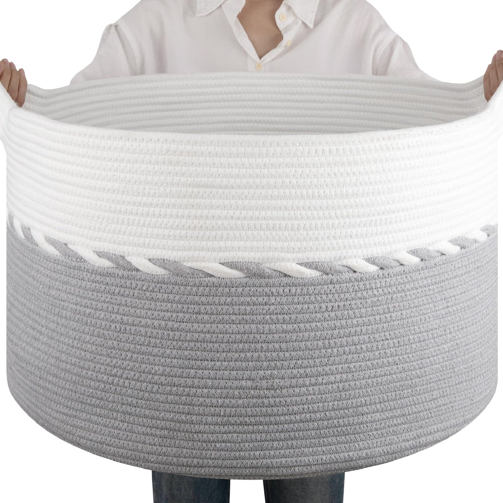 OIAHOMY blanket basket gray-white in living room for organized storage.