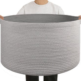 OIAHOMY blanket basket living room 01 shows sturdy handles for clutter-free storage.