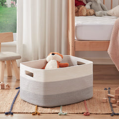 OIAHOMY blanket basket with sturdy handles for easy transport.