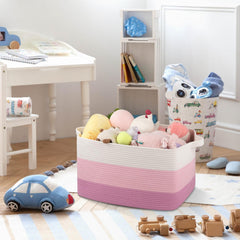 OIAHOMY gradient pink stacked blankets inside the basket for clutter-free spaces.