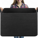 OIASKET 118L blanket basket full of blankets demonstrates spacious storage for living rooms.