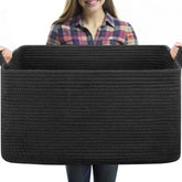 Oiasket 70L large blanket basket in black shows a woven design for easy blanket storage