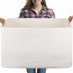 OIASKET 95L blanket basket stores blankets for organized living room storage.