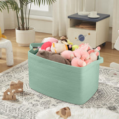 OIASKET 95L blanket basket filled with blankets for quick organization in any room.
