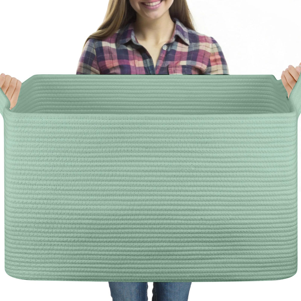 OIASKET 95L blanket basket top view showing ample blanket storage for a tidy living room.