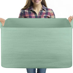 OIASKET 95L blanket basket top view showing ample blanket storage for a tidy living room.