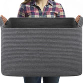 OIASKET 95L large blanket basket filled with blankets for tidy living room storage.