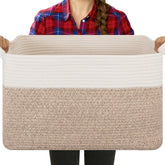OIASKET blanket basket in living room with soft cotton rope texture for tidy storage.