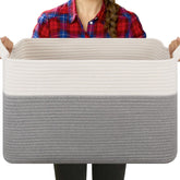 OIASKET blanket basket in living room showing tidy storage and soft texture