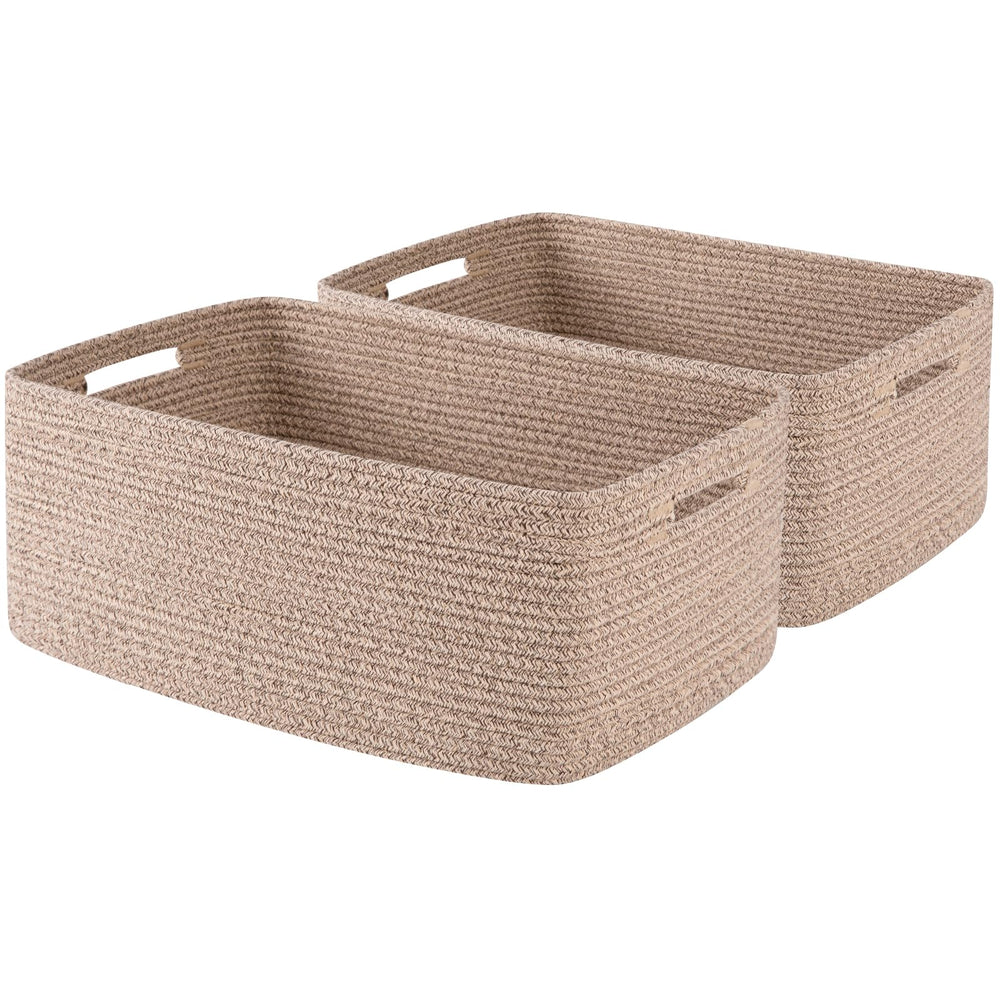 OIASKET large storage basket on a shelf keeps clothes neatly organized.