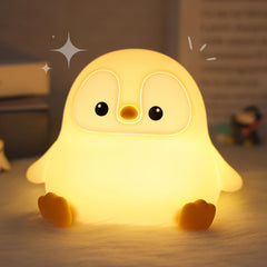 Okayera Penguin Night Light, front view, soft bedtime glow.