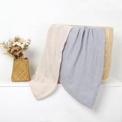 okdiy large 47x47 muslin blanket displayed on crib