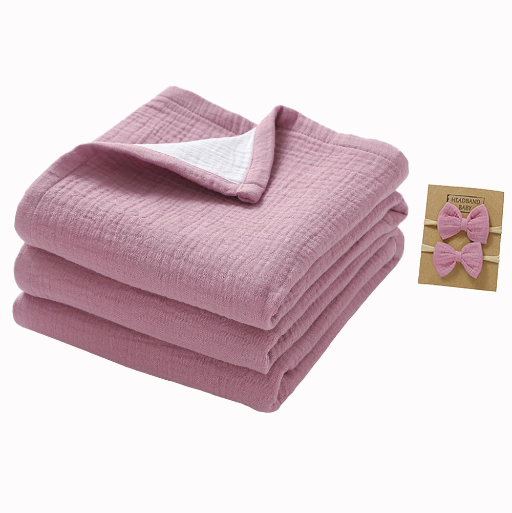 okdiy violet-white muslin blanket folded for cozy on-the-go snuggling