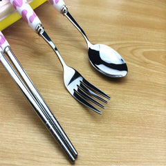 OLizee cow-pattern flatware fork showcases ceramic handle for kid-friendly meals on the go.