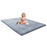 Omzer Baby Play Mat corner close-up highlighting 1.3-inch foam cushioning for soft landings.