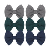ONENINEDREAM navy bow clip adds a versatile daily accent with secure grip.