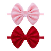 ONENINEDREAM velvet bows red on stretchy headband for comfortable newborn styling.