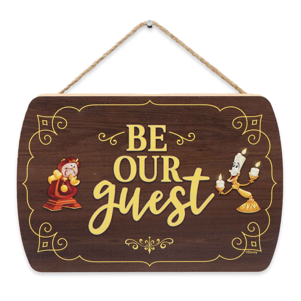 Open Road Brands Be Our Guest wall decor wood sign closeup highlighting classic typography on wood grain