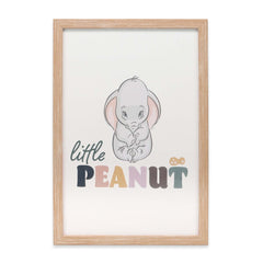 Open Road Brands Disney Dumbo Little Peanut framed wall decor in soft pastel tones for nursery ambiance.