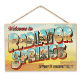 Open Road Brands Disney Pixar Cars Radiator Springs wall decor with sunset design for kids' rooms.