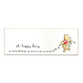 Open Road Brands Disney Winnie the Pooh Oh Happy Daisy wall art with daisies for nursery charm