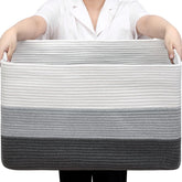 Optish 95L Blanket Basket full of blankets for organized living room