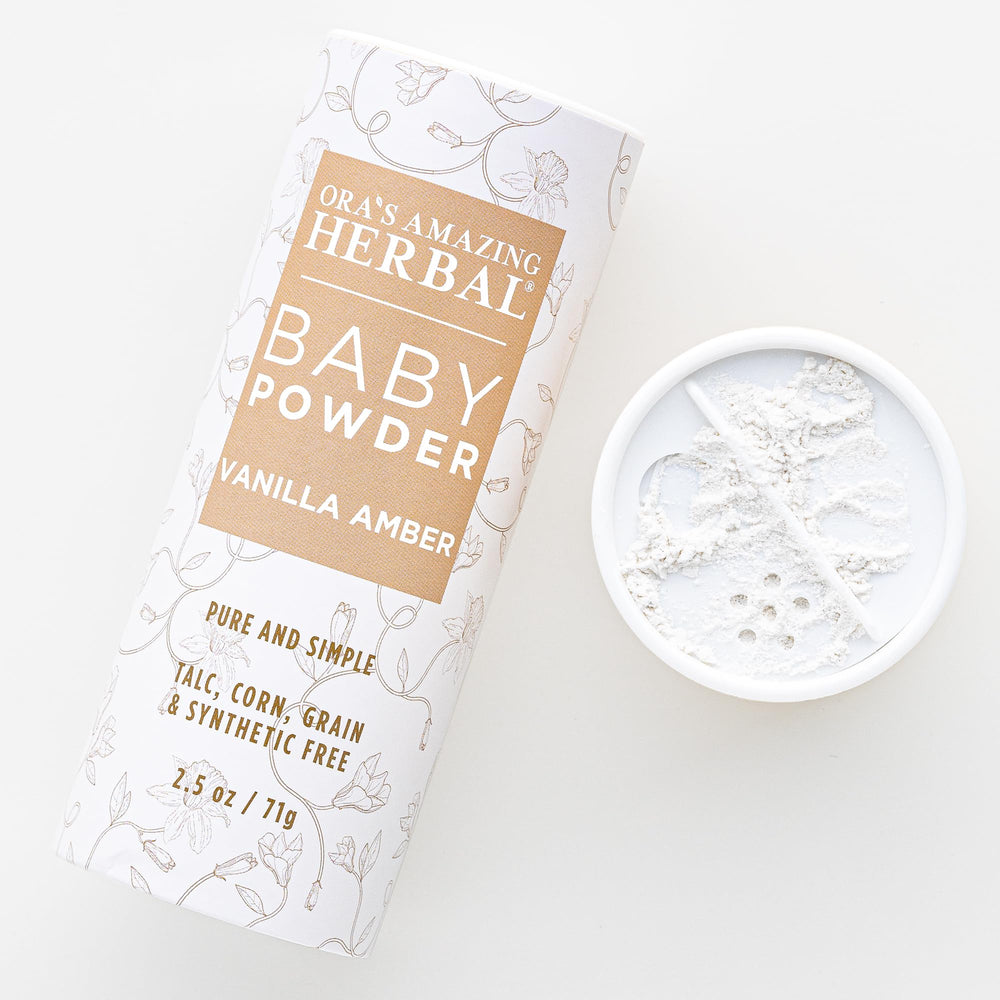 Ora's Amazing Herbal baby powder bottle with Vanilla Amber scent for gentle daily freshness