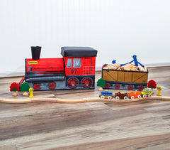 Orbrium train bin close-up shows detailed graphics on engine and hopper car for immersive play.