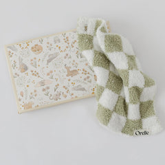 Orelle checkered lovey sage closeup fabric highlights plush texture for soothing baby touch