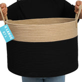 OrganiHaus large woven storage basket with blankets keeps living room organized.