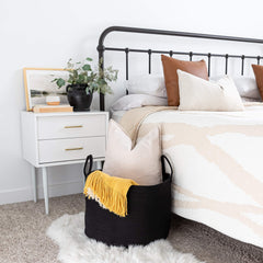 OrganiHaus nursery hamper storing cushions and plush toys in a calm space