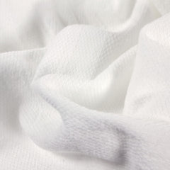 OsoCozy Birdseye cotton texture close-up highlights softness.