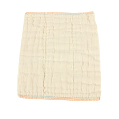 OsoCozy unbleached prefold diapers flatlay highlights softness and natural cotton texture