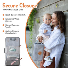 Outbound Basics organizer hanging from a hook for convenient restroom changes.