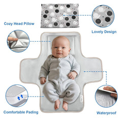 Outtip Snail Changing Mat waterproof surface close-up showing easy cleaning.