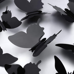 Outus removable butterfly wall decals in black for flexible decorating.