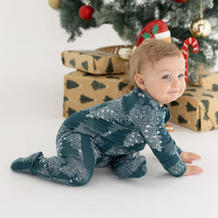 Owlivia footed sleeper in Pine print keeps tiny feet warm
