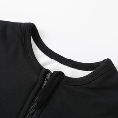 Owlivia sleep sack features 2-way zipper for easy diaper changes.