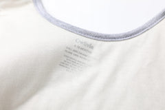 Owlivia sleep sack layered-material close-up shows breathable organic cotton and soft quilting.
