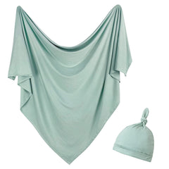 OWLOWLA Sage newborn swaddle blanket flat lay shows soft rayon-spandex fabric for gentle wrap