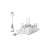 OXO Tot Bottle Brush with Stand ready for tall bottles and easy drying.